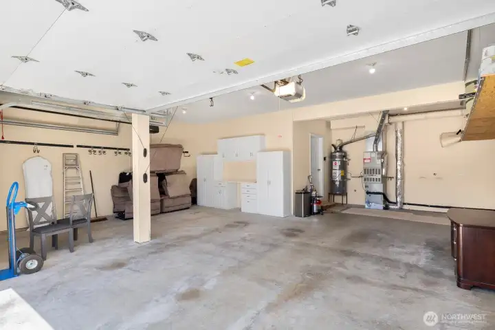 Third bay is extra deep (37'+)!! Perfect for boat, car enthusiasts and/or workspace area! Built in cabinets stay! Third bay is extra deep (37'+)!! Perfect for boat, car enthusiasts and/or workspace area! Built in cabinets stay!