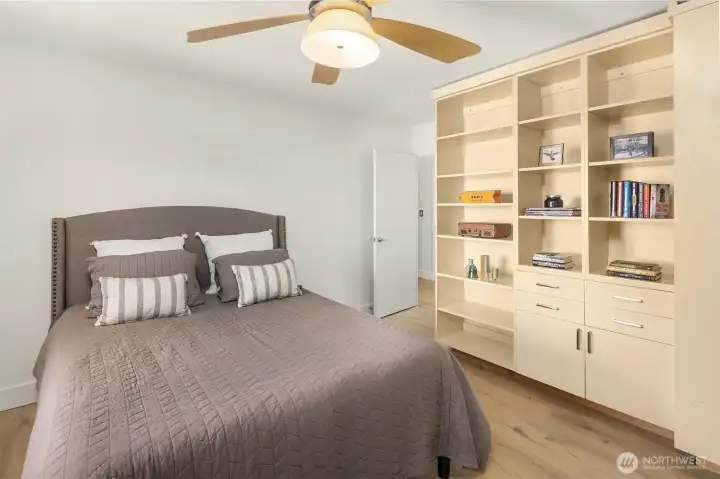 Custom built in shelves and wardrobe. Custom built in shelves and wardrobe.