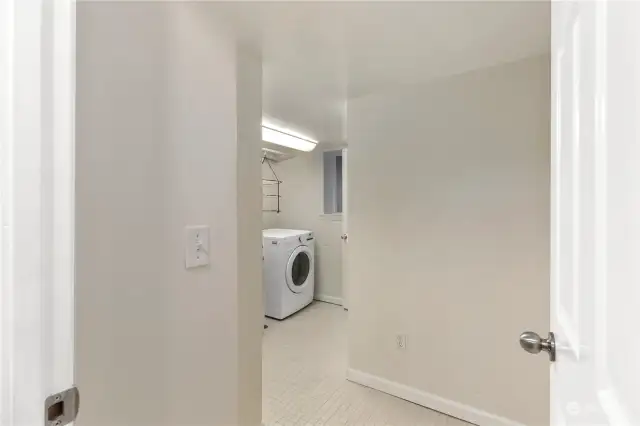 Large walk in laundry with half bath
