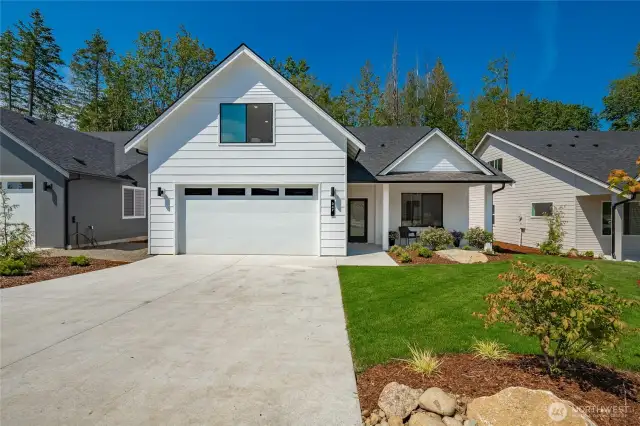 Photos shown are of a similar floor plan previously built in a different neighborhood (The Ridge in Blaine). Finishes and features may vary. Some items pictured reflect buyer-selected upgrades which are not included in the base price and may be added at an additional cost.