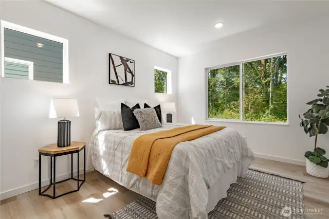 Photos shown are of a similar floor plan previously built in a different neighborhood (The Ridge in Blaine). Finishes and features may vary. Some items pictured reflect buyer-selected upgrades which are not included in the base price and may be added at an additional cost.