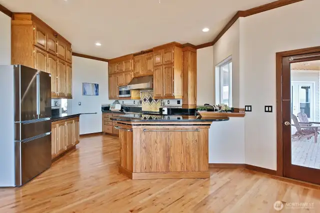 Spacious kitchen with access to covered deck