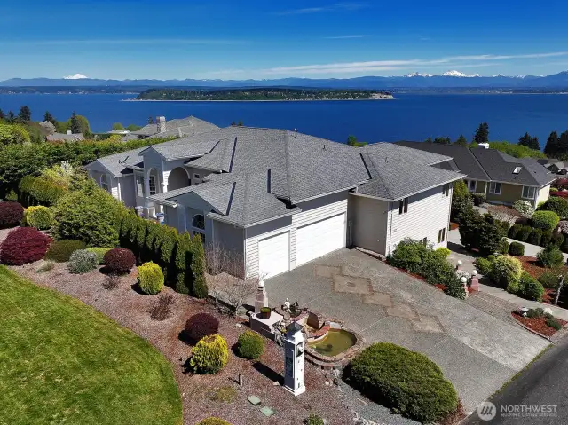 3 car garage with ample driveway parking