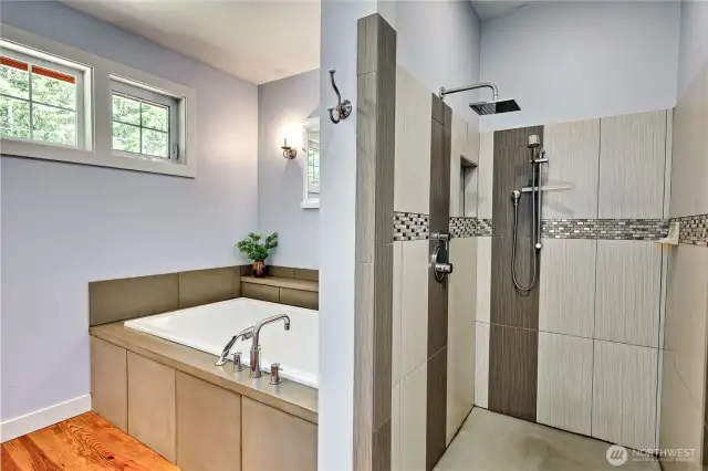 The primary suite has both a spa-like tiled showed and an oversize 2-person tub for those relaxing evening soaks.