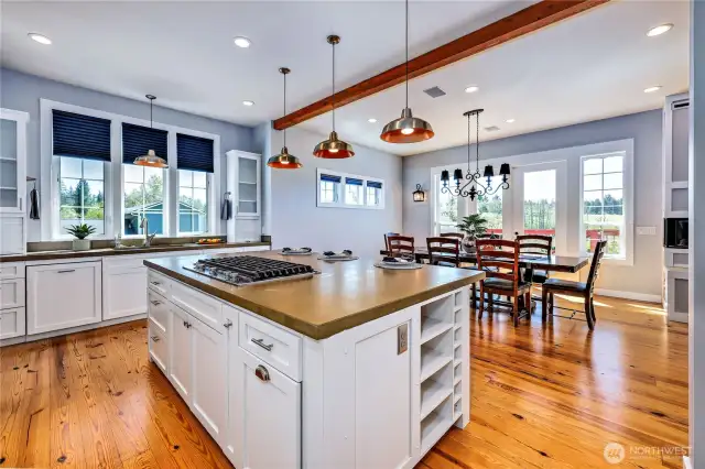 This home was tastefully designed with 10-foot ceilings, custom 8-foot doors and extensive windows on the main level. This brings the outdoors in year round, giving these living spaces an exceptional feel while maintaining intimacy.