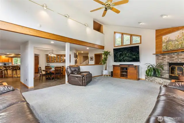 Living room with view of dining room and kitchen