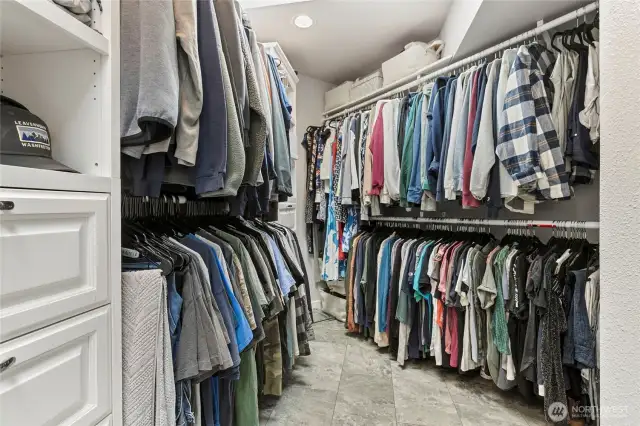 Primary bedroom walk-in closet