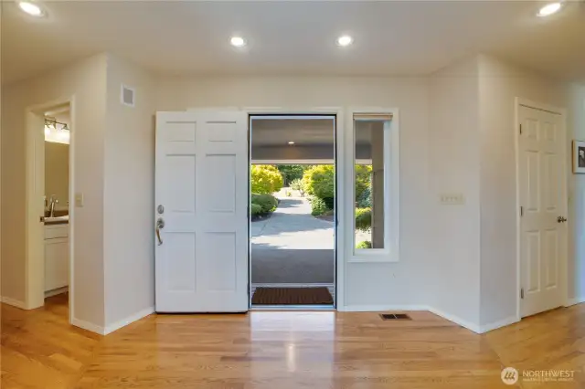 Front door is perfectly situated to welcome friends and family as they come by!