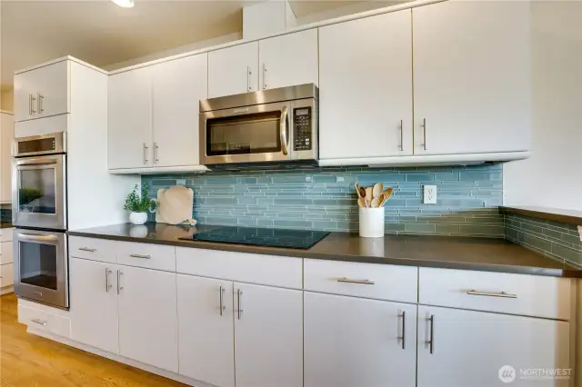 Kitchen Aid appliances and induction range top.