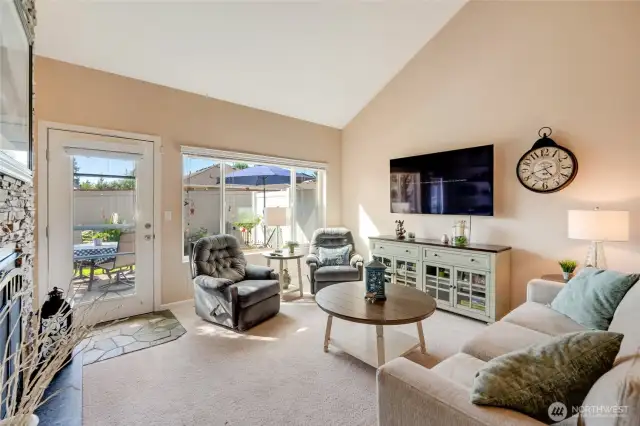 Just beyond, the cozy family room invites you to relax and unwind.