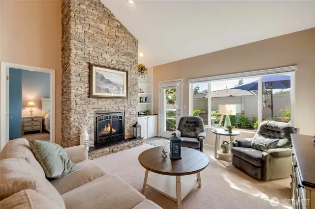 Centered around a warm gas fireplace, this space is perfect for movie nights, game days, or curling up with a book.