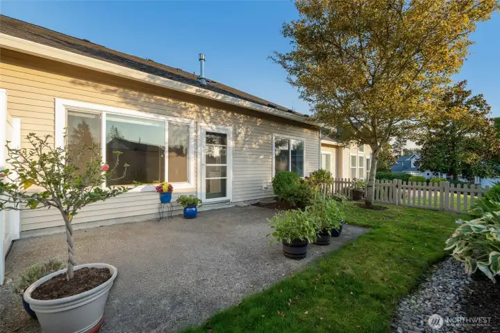 Enjoy the privacy of your fenced yard—an ideal spot for pets, a small garden, or simply soaking up sunshine.