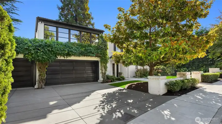 Rare 3 car oversized garage and large off-street parking pad.