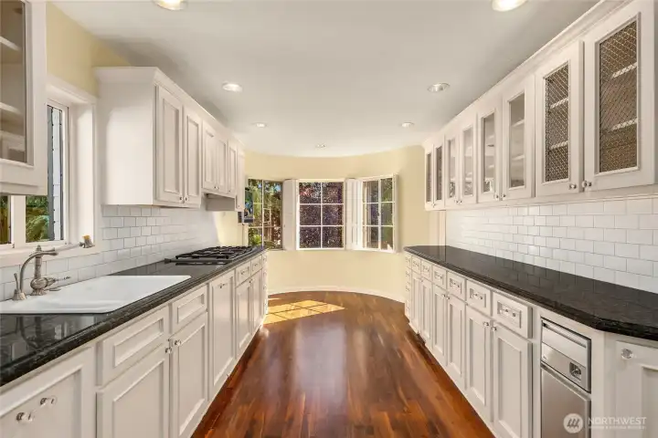Gallley kitchen with room for a breakfast table at the end.