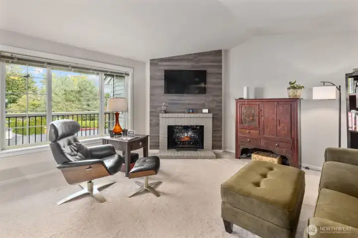 Light and bright, vaulted ceilings, wood burning fireplace currently has an electric insert that can be removed or stay.