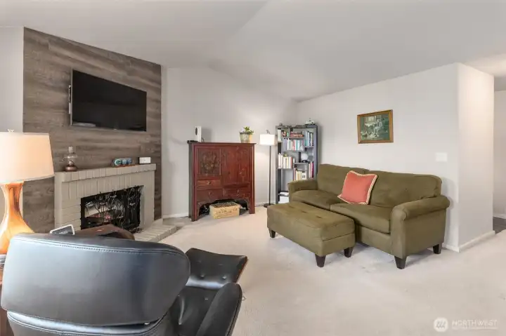 Light and bright, vaulted ceilings, wood burning fireplace currently has an electric insert that can be removed or stay.