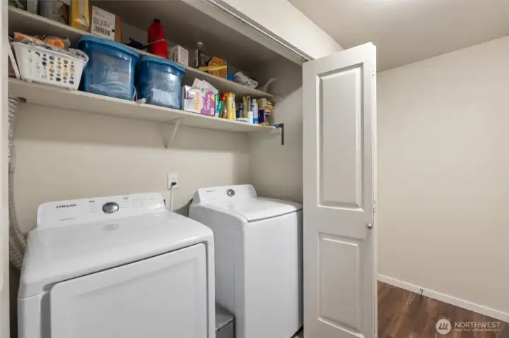 In unit laundry, with lots of storage. washer and dryer stay with the unit.