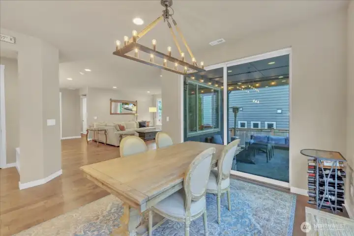 Conveniently located slider entrance to the covered outdoor entertaining space.