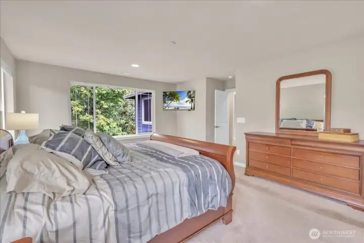 Second view of primary bedroom.