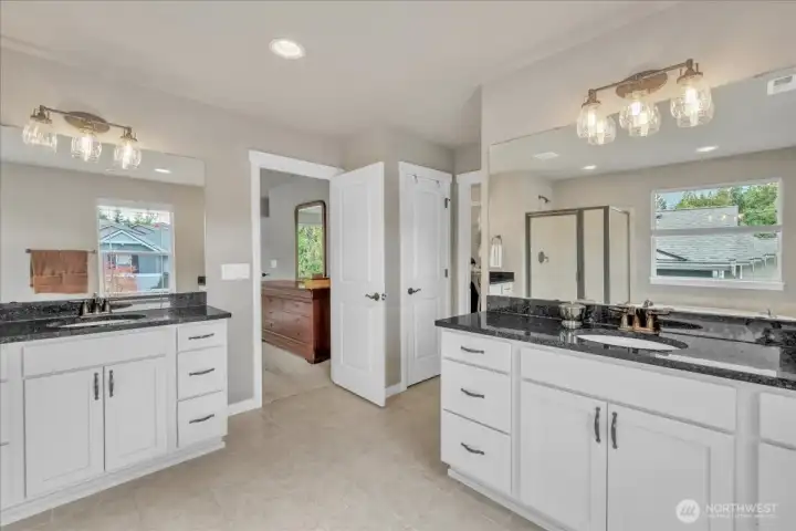 Two sinks with their own dedicated counter and drawer spaces!