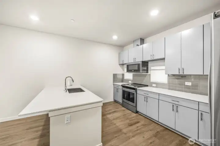 Quartz counters and sleek cabinets