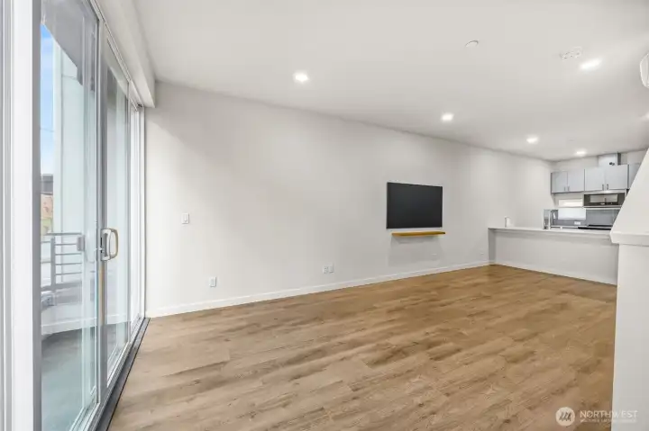 Living room with slider door to balcony.