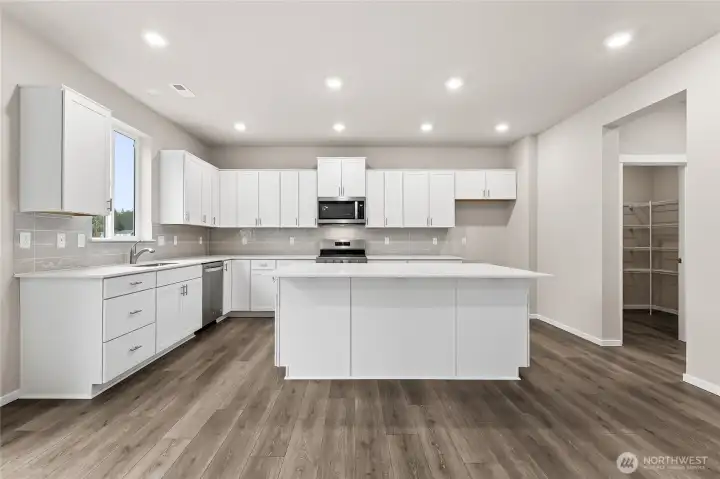 Kitchen with Island and Eating Overhang.