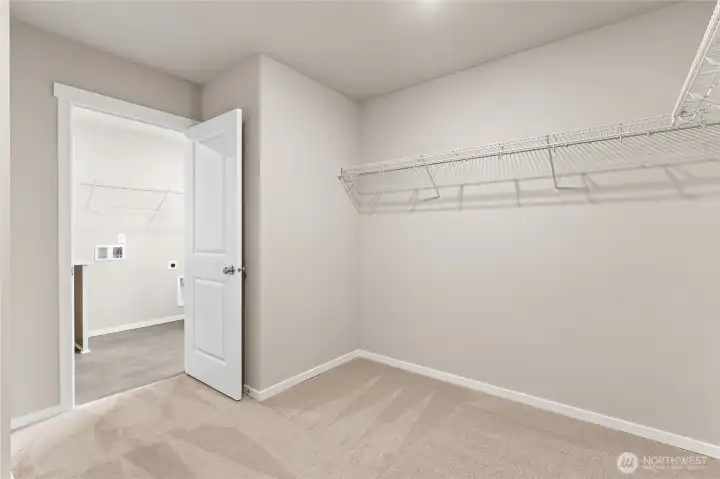 Primary Bedroom Walk in Closet.