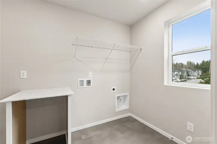 Convenient Upstairs Laundry connected to Primary Bedroom Closet.