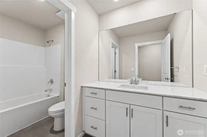 Guest Bathroom with separate Shower and Vanity Area.