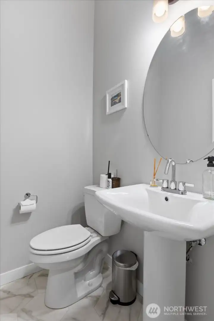 Main floor half bath for guests.