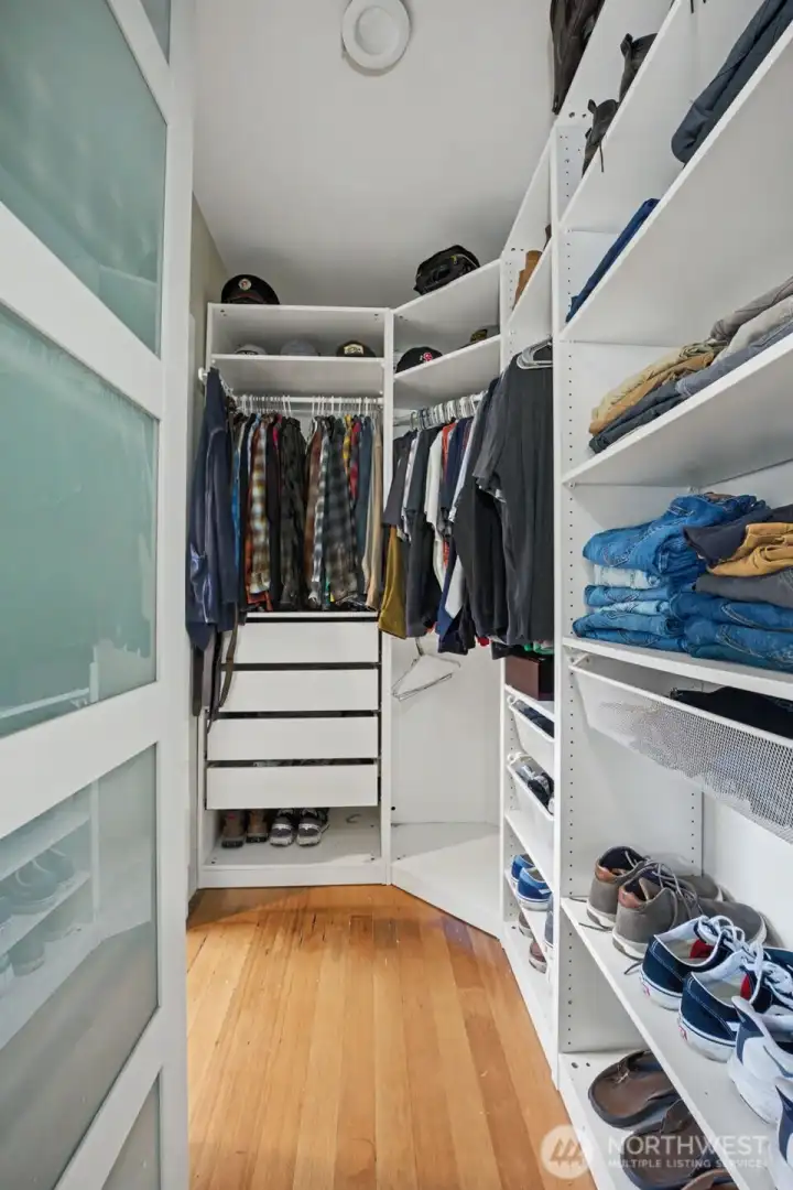 Primary Closet w/built ins.