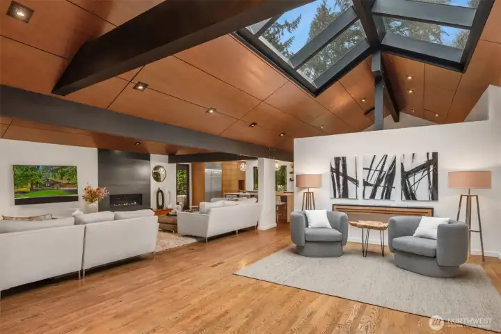 Vaulted ceilings with walnut stained detail and wood beams