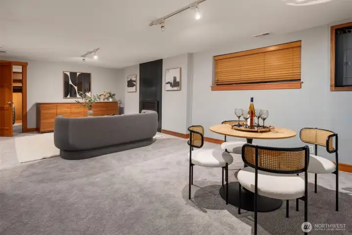 Versatile lower level designed for media, lounge, or entertaining