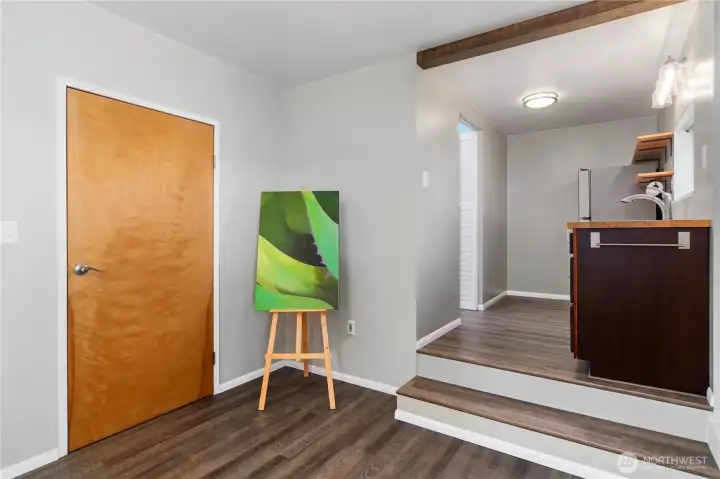 Studio entry to garage facing kitchen.