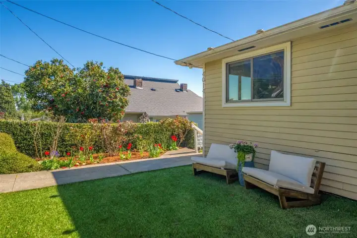 Easy low maintenance landscaped front yard.