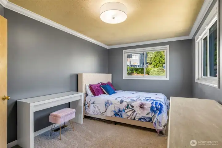 One of two main floor bedrooms.