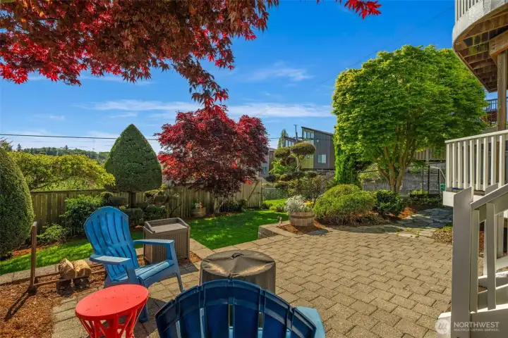 Perfectly landscaped and maintained, this home lives like a vacation. So many spaces to spread out and enjoy! Alley access in the back.