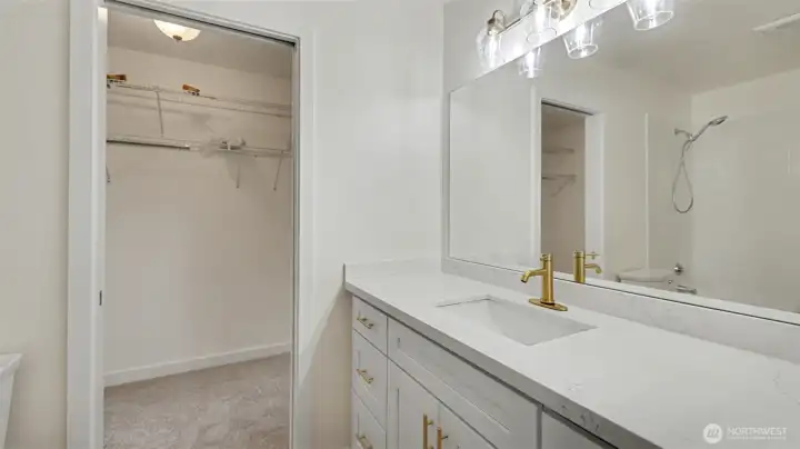 Master bath with walk in closet Master bath with walk in closet