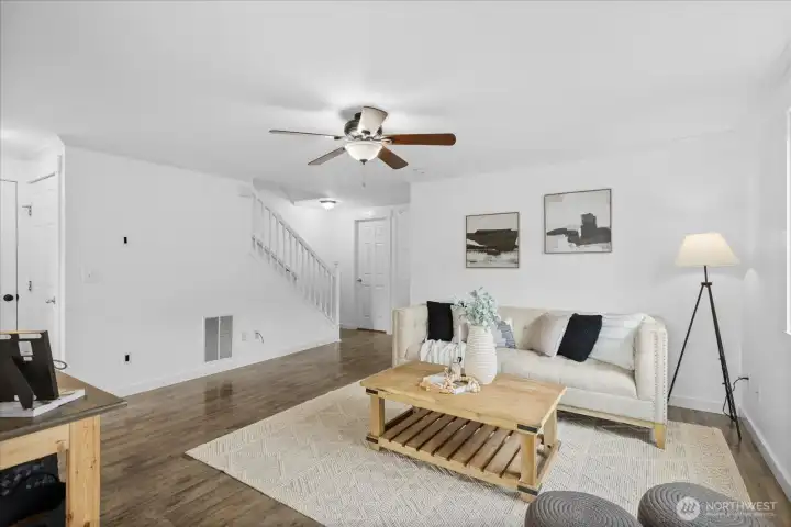 LVP flooring and fresh paint throughout the main level.