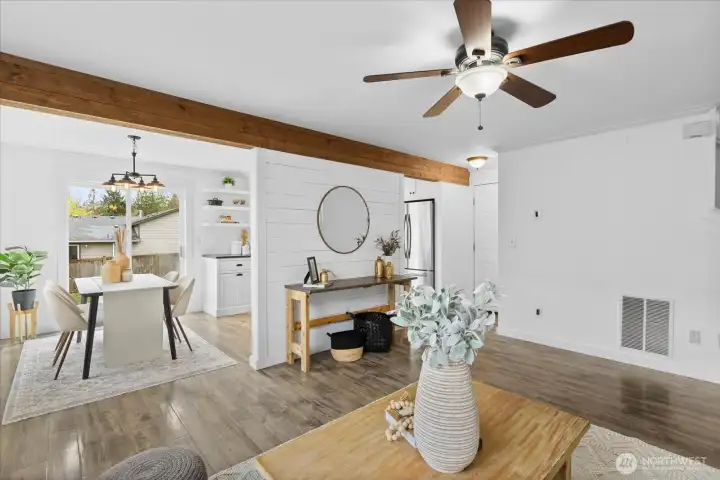 Enjoy the seamless connection between the kitchen, dining area, and living room.