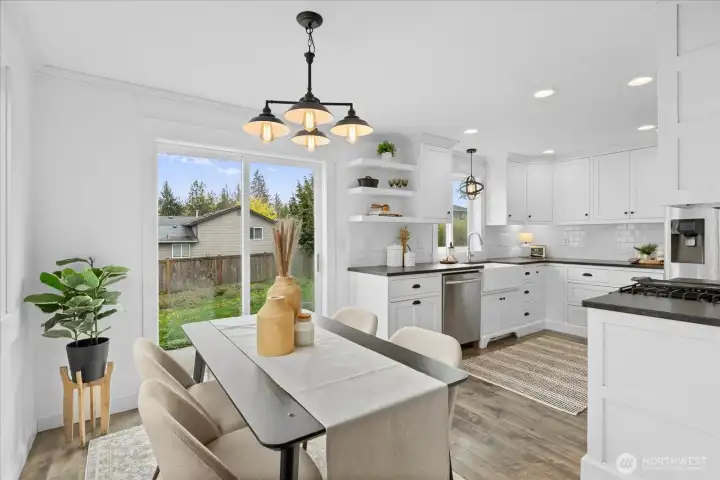 Dining room off the living room with slider to the back yard makes for easy entertaining.