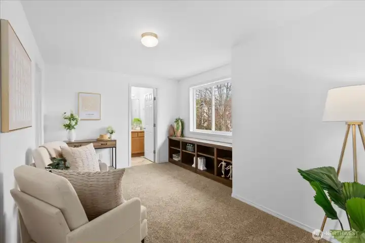 A large loft doubles as a family room with plenty of space for movie night or just relaxing with a good book.