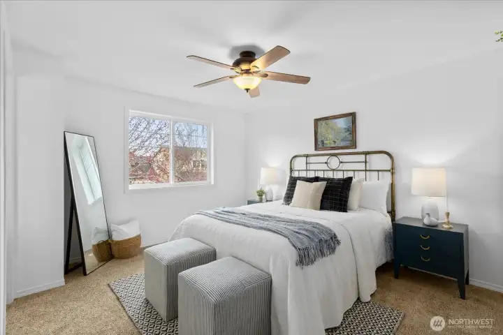 The primary bedroom features a an en-suite & a walk-in-closet.