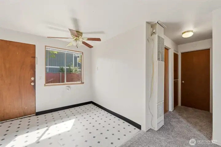 Another dining area view showing the hallway to the bedrooms.