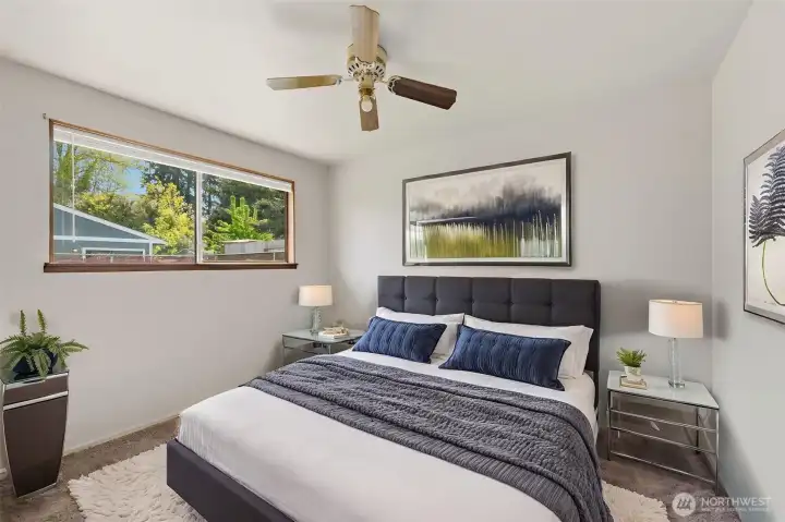 The second bedroom is shown here virtually staged.