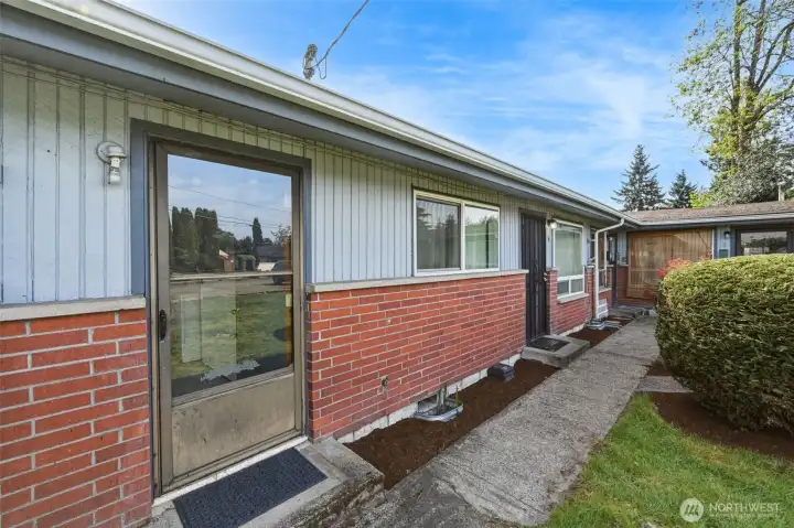 This door at the end of the complex is a shared laundry room.