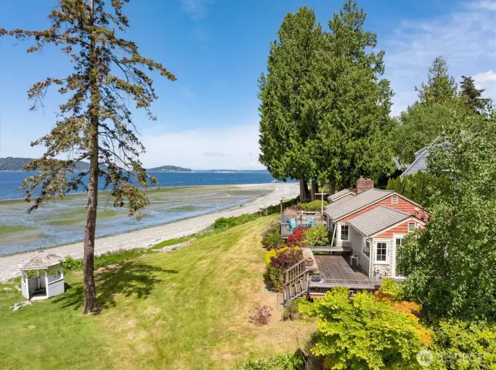 An overhead look at Poulsbo's best kept secret, 3/4 of an acre, a two bedroom cabin and all the views fit for print. Photos taken at low tide. An overhead look at Poulsbo's best kept secret, 3/4 of an acre, a two bedroom cabin and all the views fit for print. Photos taken at low tide.
