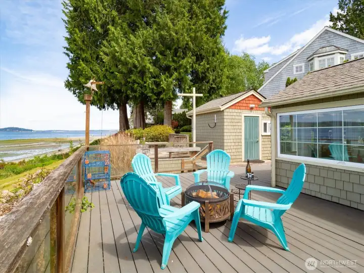 Welcome summer on the main deck looking out at Hood Canal & The Olympics. Welcome summer on the main deck looking out at Hood Canal & The Olympics.
