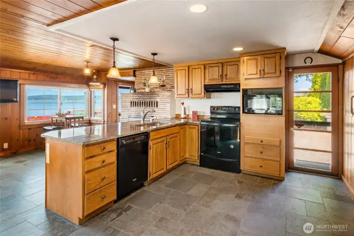 Get your cookbooks ready! The nicely equipped kitchen is ready for whatever culinary endeavors you choose to undertake. Get your cookbooks ready! The nicely equipped kitchen is ready for whatever culinary endeavors you choose to undertake.